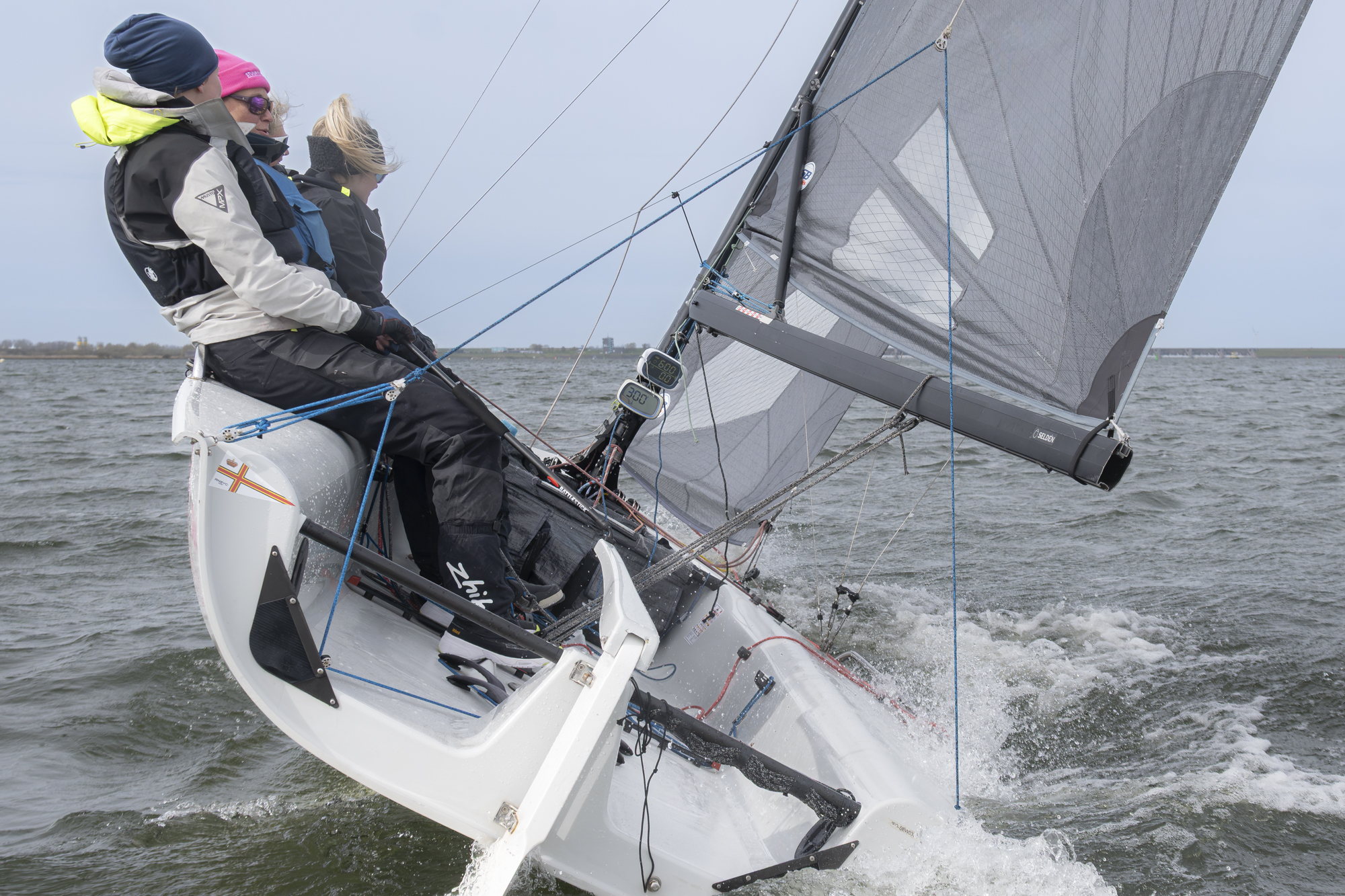 Trimmen aan de schoot tijdens de race